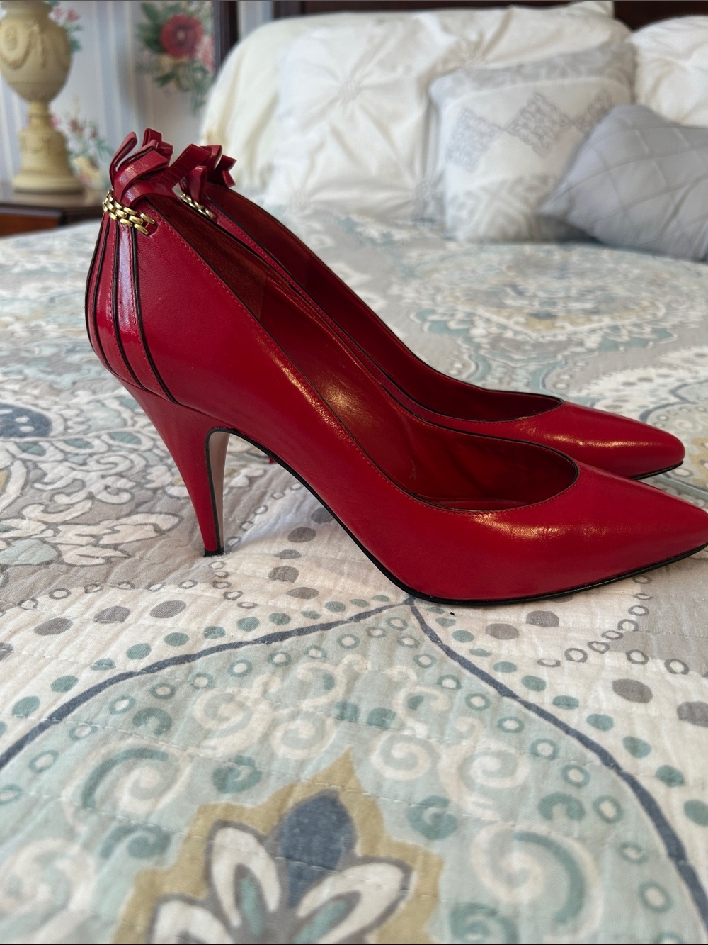 Versani Red Pointed-Toe Leather Pumps with Gold Chain Accent